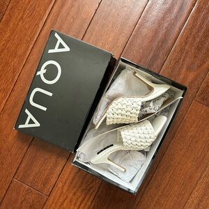 Aqua Womens Katy white Faux Leather Slip
On Mules